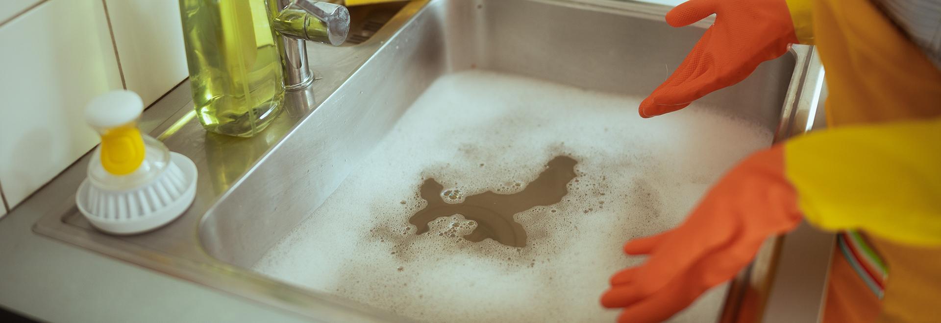 clogged sink that needs drain cleaning
