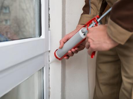 Air sealing home with window caulking 