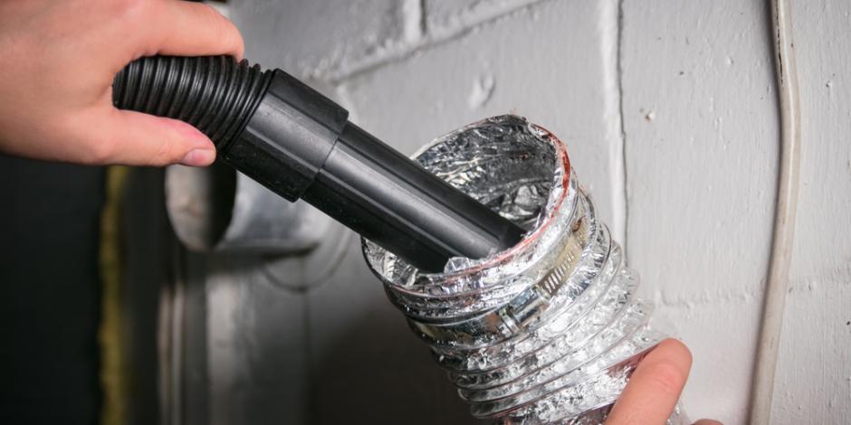 dryer vent being vacuumed
