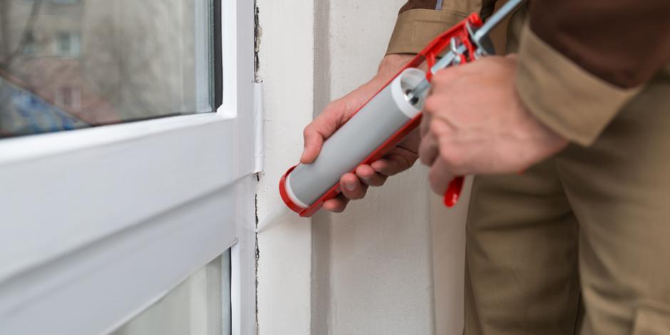 Air sealing home with window caulking 